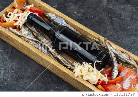 Beer and assorted dried fish Beer and assorted dried fish 133131757