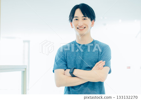 A young man in training wear posing A young man in training wear posing 133132270