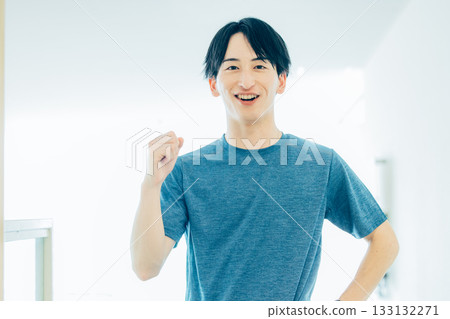 A young man in training wear posing A young man in training wear posing 133132271