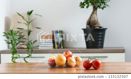 a bowl of fruit on a table in a home setting a bowl of fruit on a table in a home setting 133132507