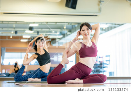 Woman doing yoga at the gym 133133274