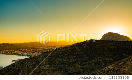 Sunset over spanish coastal hills landscape Sunset over spanish coastal hills landscape 133135506