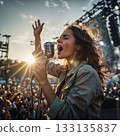 Female singer singing passionately at an outdoor concert, an enthusiastic concert 133135837