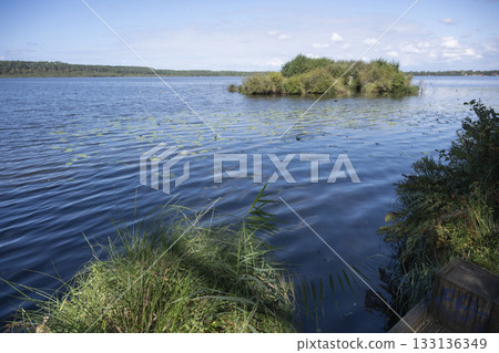 Scenic view of Lac de Leon with natural beauty and calm waters 133136349