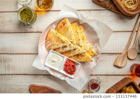 Quesadilla with chicken and cheese Quesadilla with chicken and cheese 133137446