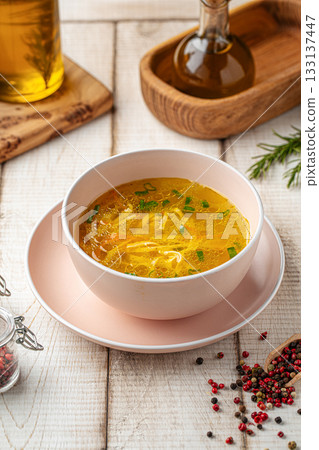Chicken noodle soup with herbs 133137447