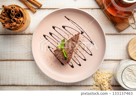 Chocolate cheesecake slice with mint Chocolate cheesecake slice with mint 133137463