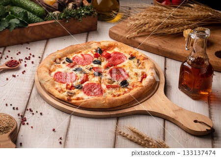 Pepperoni pizza with olives and cheese Pepperoni pizza with olives and cheese 133137474