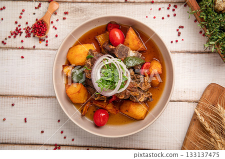 Fried meat with potatoes and onions 133137475
