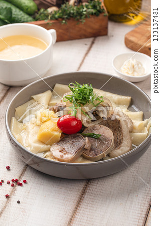 Beshbarmak with broth and meat 133137481