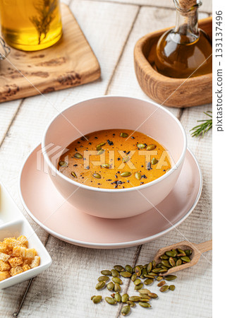 Lentil soup with seeds and croutons 133137496