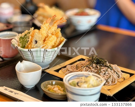 Delicious tempura bowl and cold soba noodles set 133137866