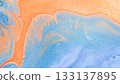 Abstract blue and orange fluid art texture featuring smooth flowing patterns, feather-like edges, and shimmering metallic particles 133137895