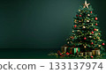 Decorated with ornaments and lights Christmas tree on dark green background. 133137974
