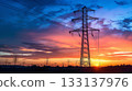 High voltage power lines   electric transmission tower in sunset. 133137976