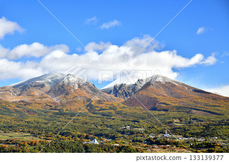View of the Asama mountain range (Mount Asama, Mount Kurofuda) covered in its first snow (Komoro City, Nagano Prefecture) [November 2025] 133139377