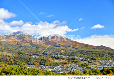 View of the Asama mountain range (Mount Asama, Mount Kurofuda) covered in its first snow (Komoro City, Nagano Prefecture) [November 2025] 133139379