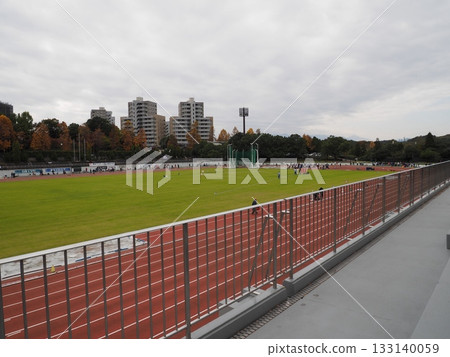 Kamiyugi Park Athletics Stadium and housing complexes in autumn Kamiyugi Park Athletics Stadium and housing complexes in autumn 133140059