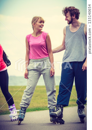 roller skater couple skating outdoor roller skater couple skating outdoor 133140654