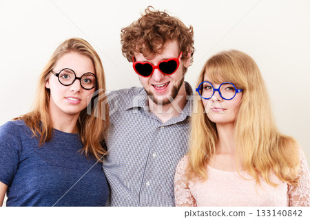 Happy friends man and women in glasses. 133140842