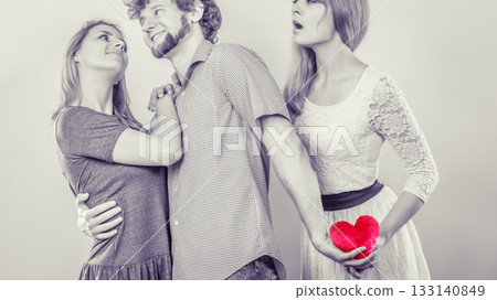 Abandoned woman with enamored couple Abandoned woman with enamored couple 133140849