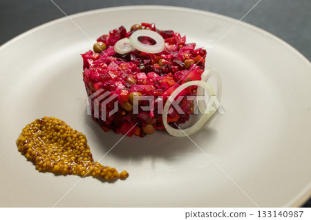 Classic Russian Beet Salad with Mustard Seeds on Plate. Vinaigrette 133140987
