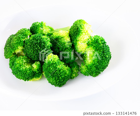 Colorful boiled broccoli on a white background 133141476