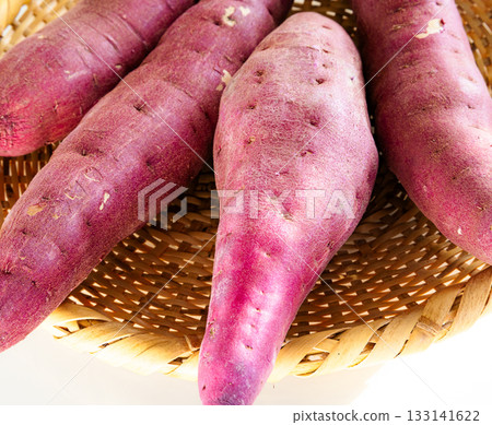 Delicious sweet potatoes in a colander Delicious sweet potatoes in a colander 133141622