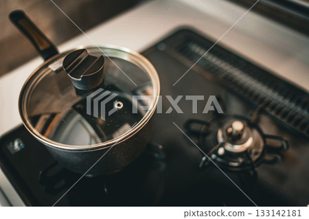 Image of a gas stove and pot Image of a gas stove and pot 133142181
