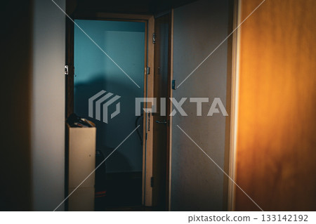 Hallway with open door Hallway with open door 133142192