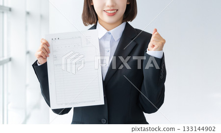 Young female job seeker with a resume Young female job seeker with a resume 133144902