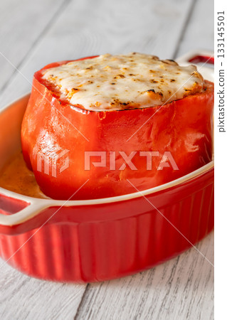 Single red bell pepper baked with bolognese filling and melted mozzarella topping Single red bell pepper baked with bolognese filling and melted mozzarella topping 133145501
