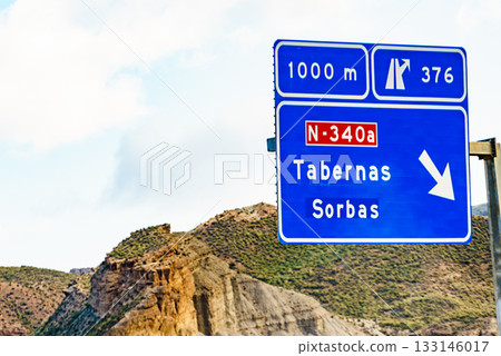 Tabernas desert landscape and road sign, Spain Tabernas desert landscape and road sign, Spain 133146017