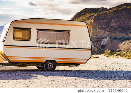 Caravan trailer in mountain nature 133146041