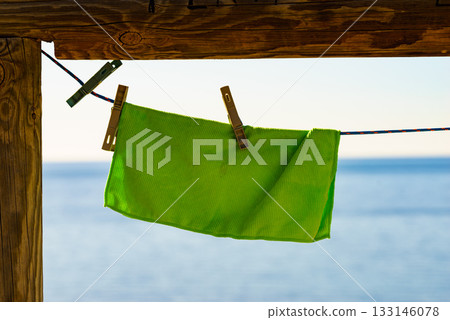 Cloth hanging to dry outdoor on beach Cloth hanging to dry outdoor on beach 133146078
