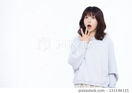 Surprised and amazed woman Surprised and amazed woman 133146135