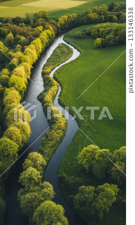 Aerial view of a winding river surrounded by lush greenery and rolling hills. This image captures the beauty of nature in a serene landscape setting. Generative AI 133146338