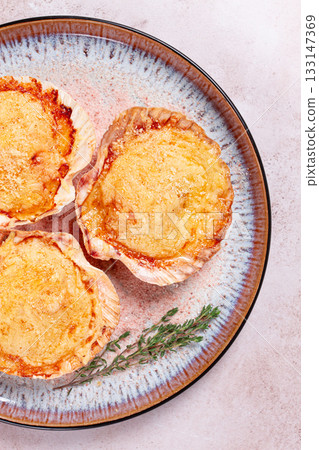 scallop, baked in shells, with cheese and spices, on a plate, homemade, scallop, baked in shells, with cheese and spices, on a plate, homemade, 133147369