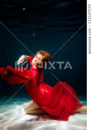 Elegant aquatic fashion, Underwater gown with cinematic glow Elegant aquatic fashion, Underwater gown with cinematic glow 133147574