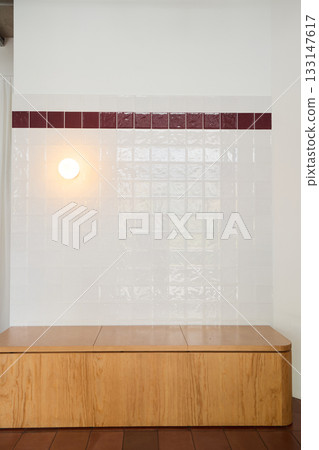 Minimalist decor highlight, Elegant wooden bench with subtle 133147617