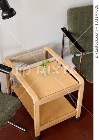 Miniature play object on vintage furniture in cozy space Miniature play object on vintage furniture in cozy space 133147626