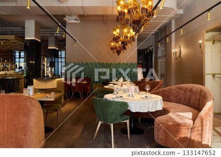 elegant dining setup, opulent dining environment featuring stylish furnishings and ambient lighting elegant dining setup, opulent dining environment featuring stylish furnishings and ambient lighting 133147652