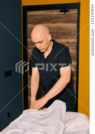 Skilled Therapist Offering Relaxing Massage Therapy for Comfort and Rejuvenation Skilled Therapist Offering Relaxing Massage Therapy for Comfort and Rejuvenation 133147654