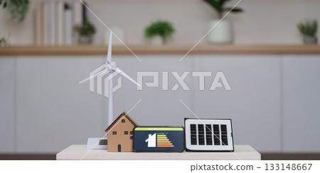 Sustainable living. Renewable energy models showcasing eco-friendly solutions. Sustainable living. Renewable energy models showcasing eco-friendly solutions. 133148667