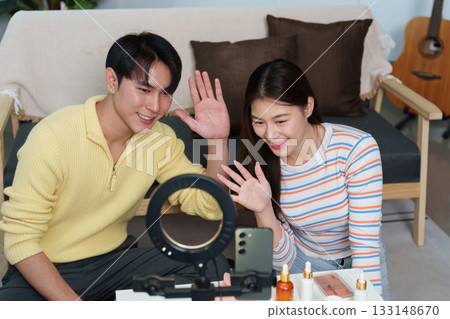 Cheerful Influencers Waving Goodbye in Video Stream Cheerful Influencers Waving Goodbye in Video Stream 133148670