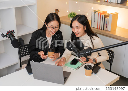Podcasting Duo Engaging in Digital Content Creation Podcasting Duo Engaging in Digital Content Creation 133148997