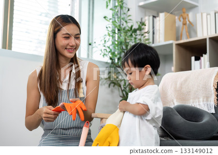 Child and Adult Preparing for Cleaning, Family Interaction Child and Adult Preparing for Cleaning, Family Interaction 133149012