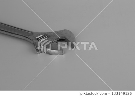 Wrench on a gray on white background 133149126