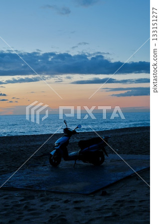 Scooter beach sunset. High quality photo 133151277