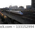 Hokuriku Shinkansen heading towards Tokyo from Kanazawa Station 133152994